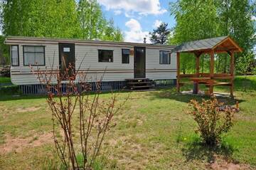 Фото номера Коттедж с 2 спальнями Кемпинги Campsite Leiputrija г. Адажи 4